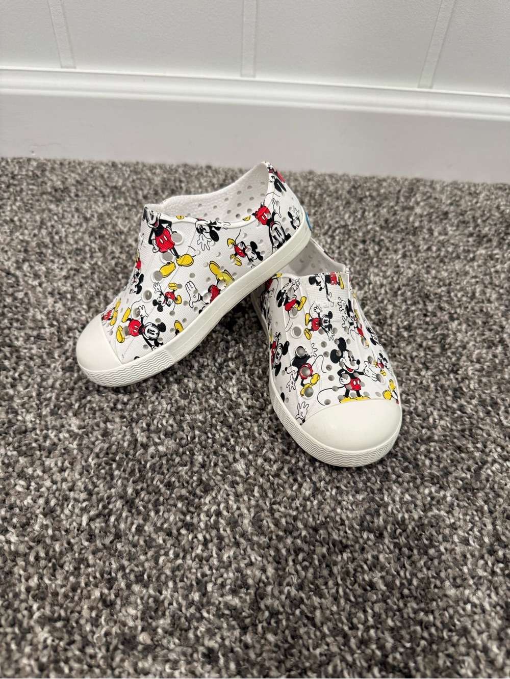 Native Kids White Mickey Pattern Slip-On Water Shoes with Red and Yellow Accents